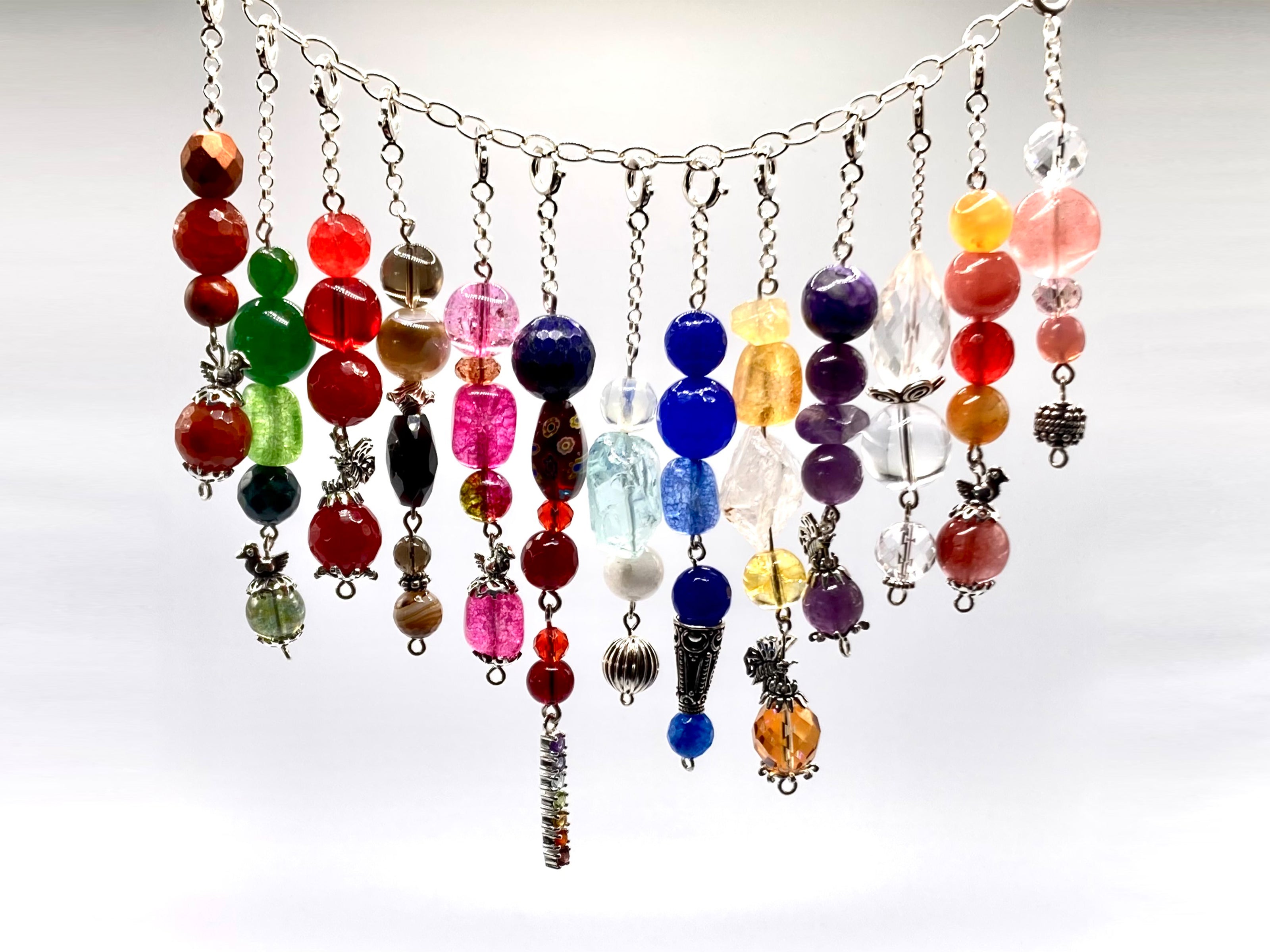 These Gemstone bobbles all have sterling silver beads and caps.