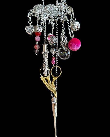Peony Collection showcasing thimble accessories, including silver charms, scissors, and decorative elements.