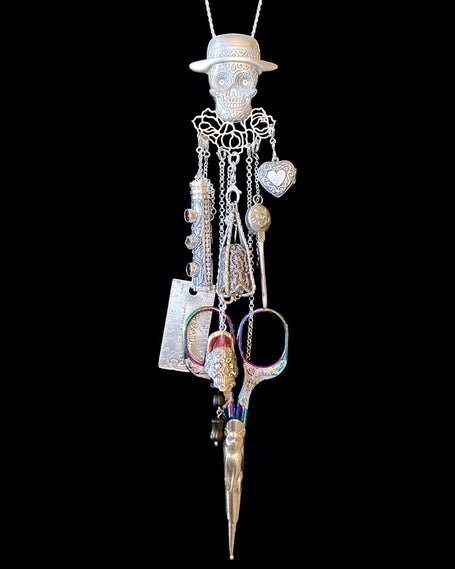 Sugar Skull Collection featuring sterling silver thimbles and sewing tools with a skull pendant and ornate charms.