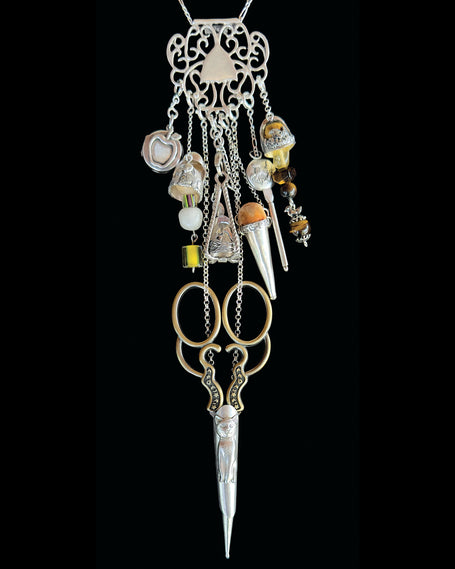 Amber Waves Collection featuring artisan thimble jewelry and sewing tools, including sterling silver thimbles and charm accessories.