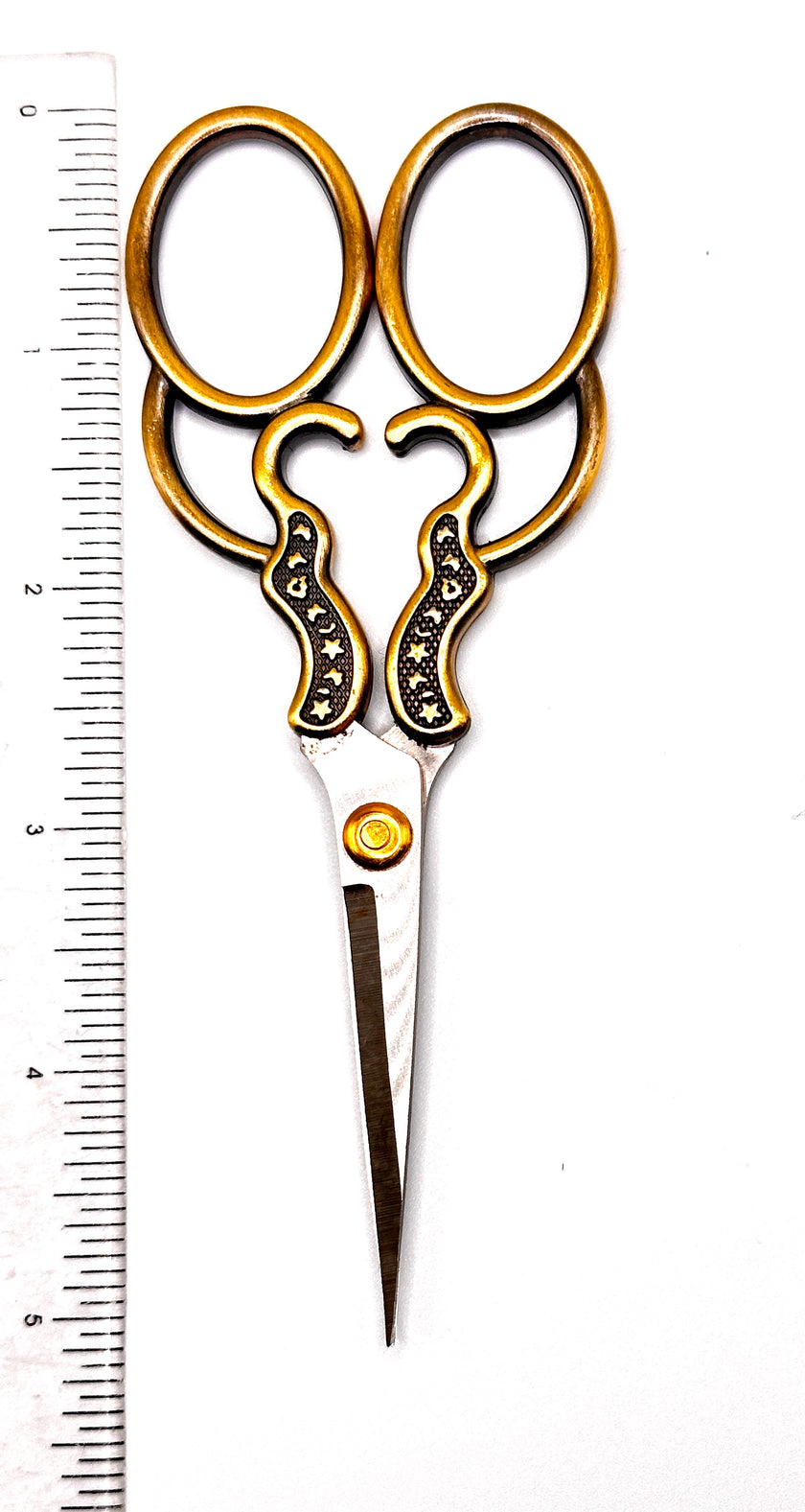 Brass Handled Scissors displayed next to a ruler for size reference, ideal for sewing and crafting.