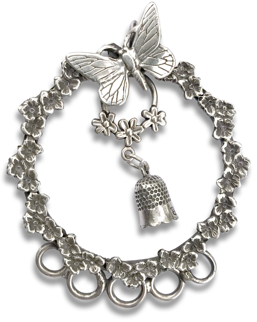 Buttercup Chatelaine with butterfly design, floral accents, and thimble holder for sewing tools and accessories.