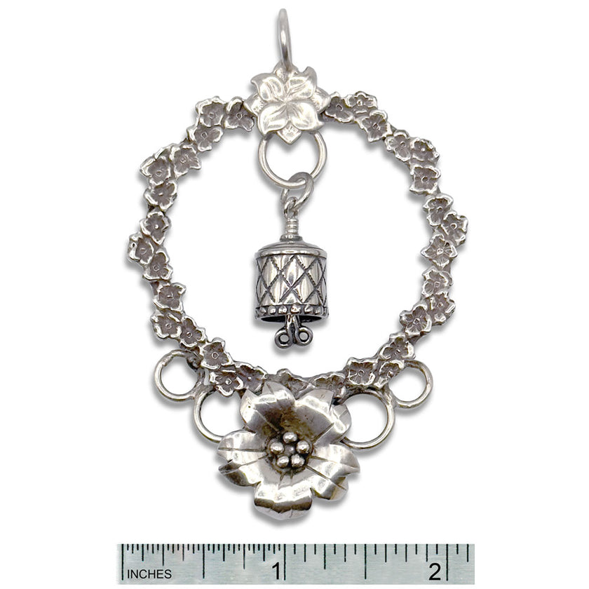 Unique Buttercup Chatelaine with sterling silver thimbles, featuring floral designs and customizable loops for sewing accessories.