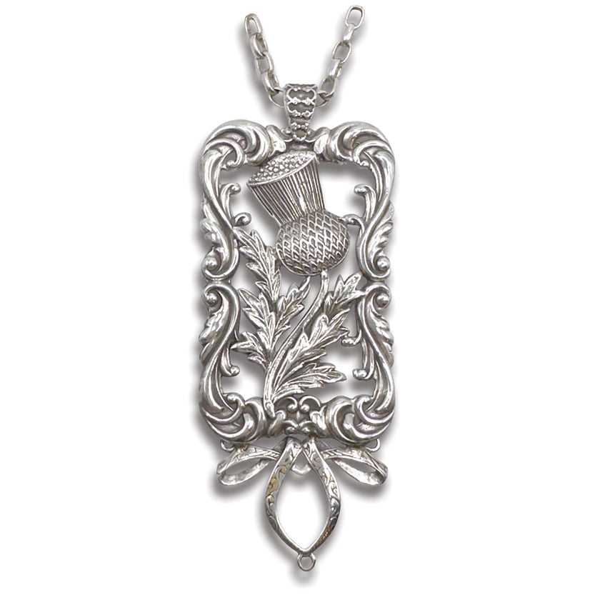 Sterling silver thimble holder featuring intricate floral design and thimble motif, ideal for thimble collectors.