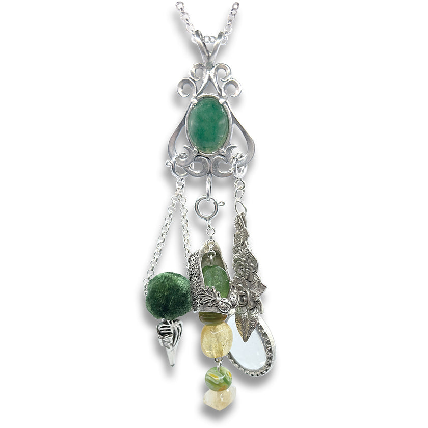 Flourish Chatelaine crafted from sterling silver with green gemstone and decorative charms for sewing tools.