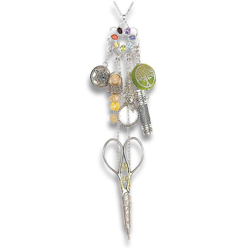Ring of Gems Chatelaine featuring colorful gems and silver accessories for sewing tools.