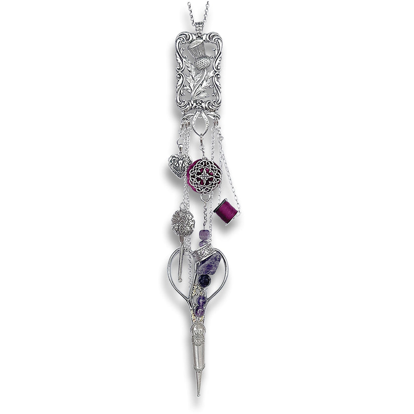 Thistle Bloom Chatelaine crafted of sterling silver with intricate design and decorative beads, showcasing artisan sewing tools.