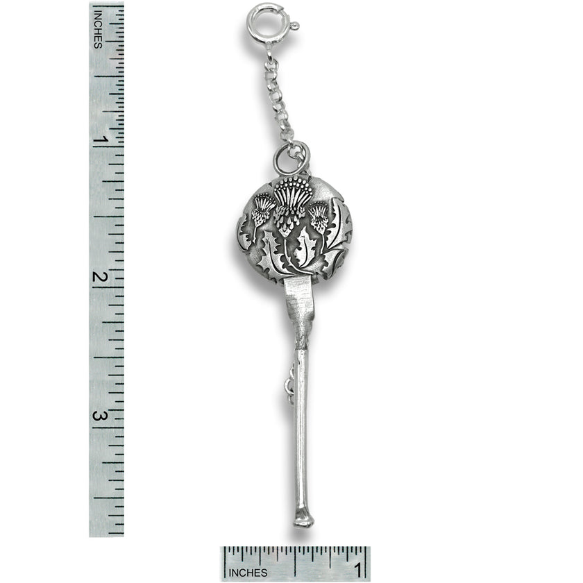 Thistle Combination Tool - Needle Threader and Thread Cutter in sterling silver, featuring thistle design and spring ring attachment.