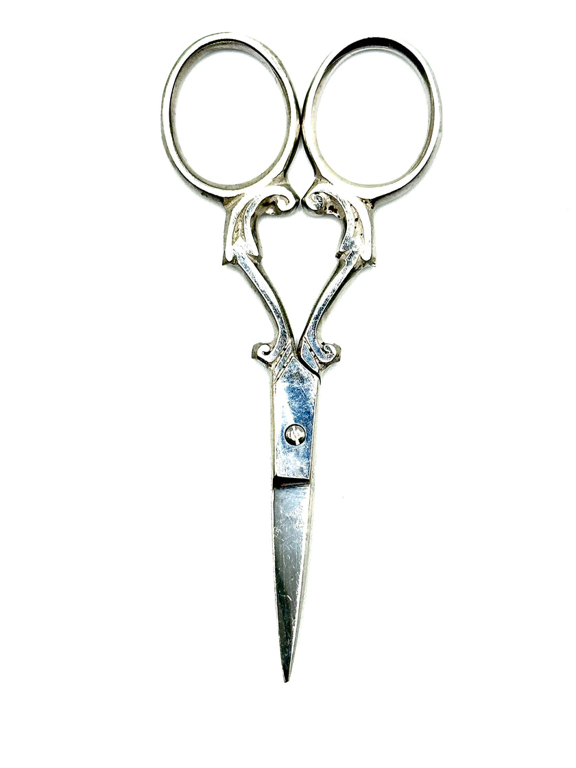 Mary Jane Scissors made with stainless steel, perfect for precision cutting and comfortable grip for sewing and crafting.