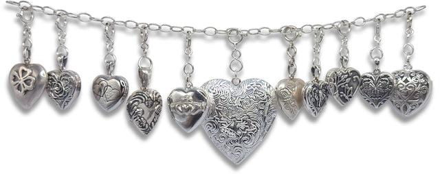 Heart Beeswax Locket showcasing unique artisan heart charms crafted in silver, perfect for thimble collecting or jewelry.