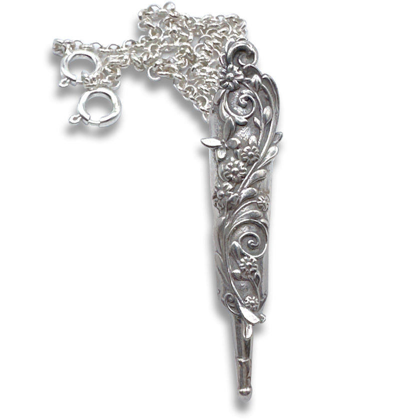 Garden Arbor Scissor Sheath with ornate silver design and chain, perfect for sewing accessories.