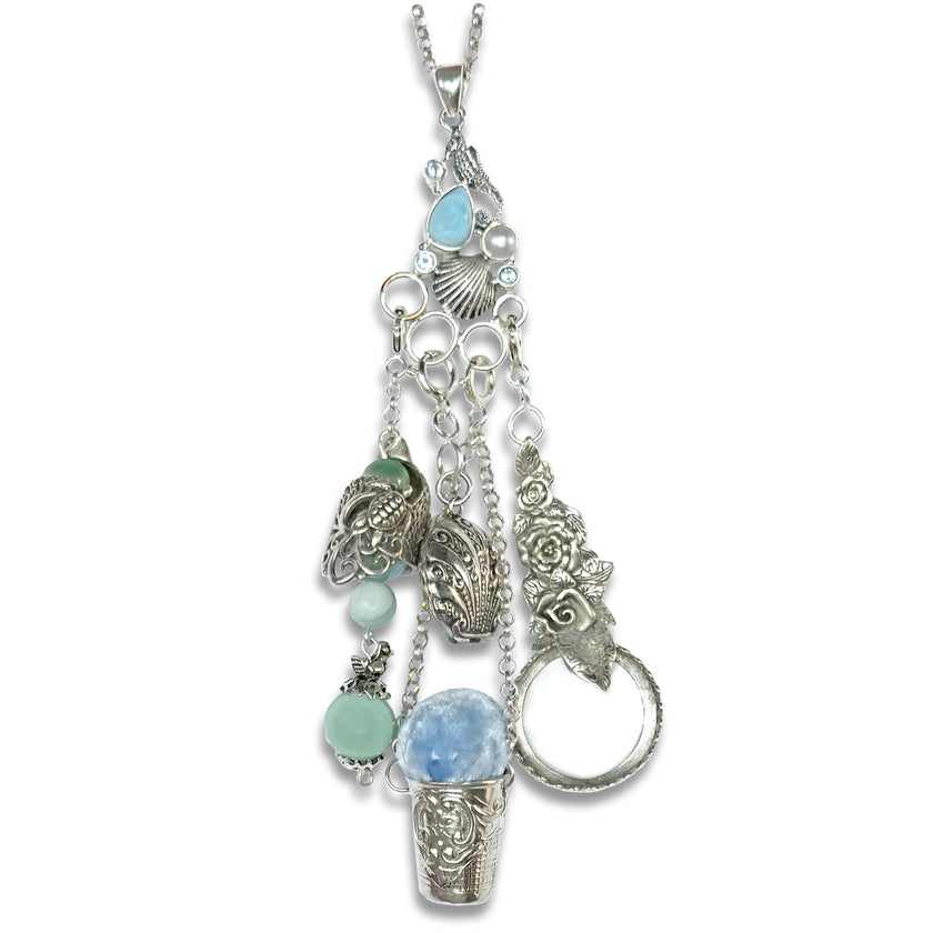 Sea Horse and Larimar Chatelaine featuring larimar, pearl, sea shell, and topaz gemstones in an elegant design.