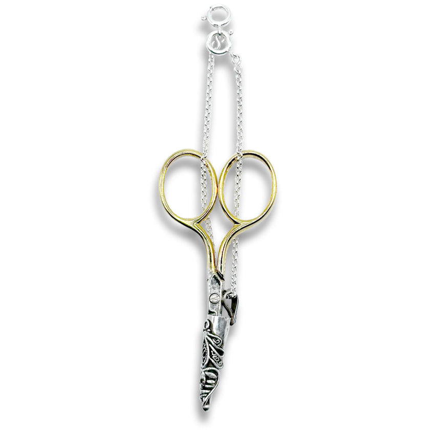 Short Stuff Scissor Sheath and Chain with intricate scissor design and decorative chain for easy access and storage.