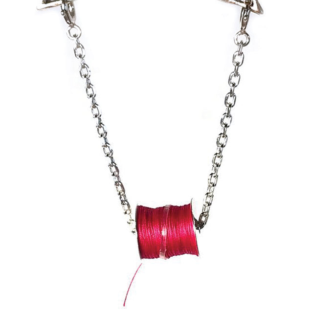Thread Bobbin in Sterling Silver with red thread, ideal for thimble collections and sewing accessories.
