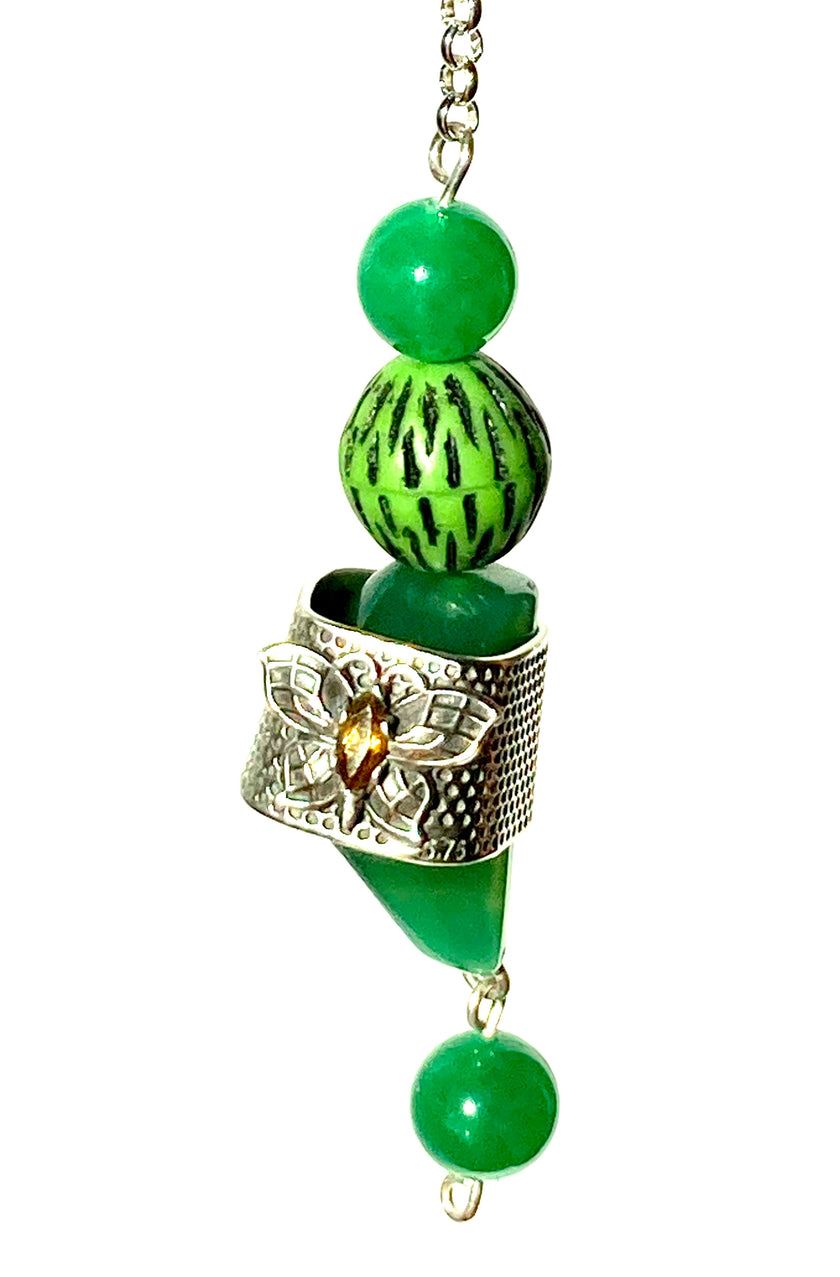Bobble with Gems Only featuring vibrant green gemstones and intricate silver design, perfect for thimble storage.