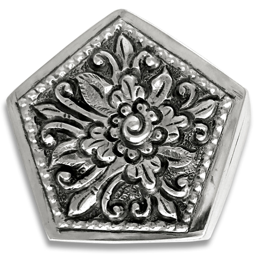 Close-up of a beautifully crafted Thimble Box - Pentagon, made of sterling silver with ornate floral design.