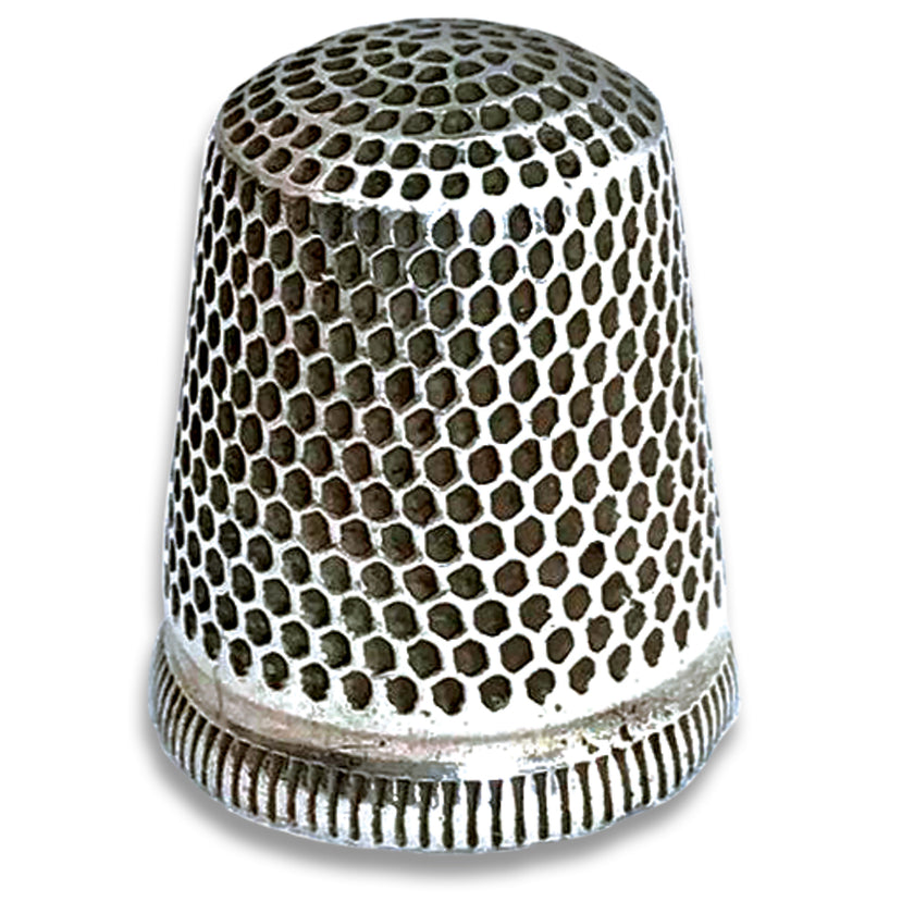 Swannie Thimble made of sterling silver, featuring a traditional design for reliable finger protection in sewing.