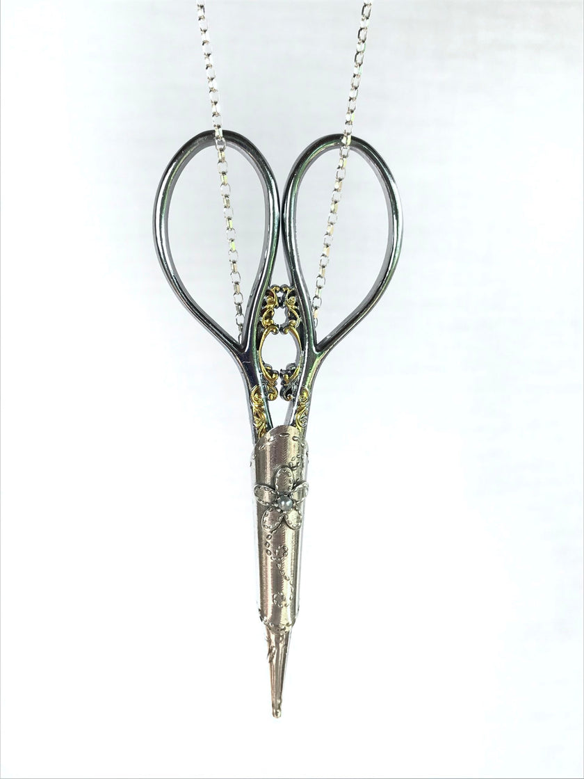 Daisy Sheath and Chain featuring sterling silver scissors on a decorative chain, ideal for sewing and crafting.