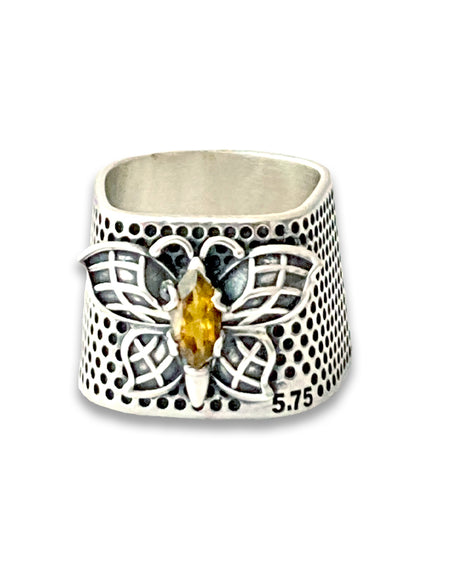 Sterling silver thimble ring with butterfly design and yellow gemstone, size 5.75, perfect for thimble collectors.