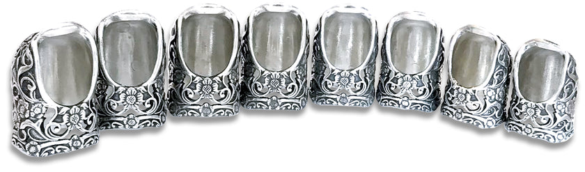 Image of a collection of silver thimbles, including the Secret Butterfly Thimble, ideal for quilting and sewing enthusiasts.