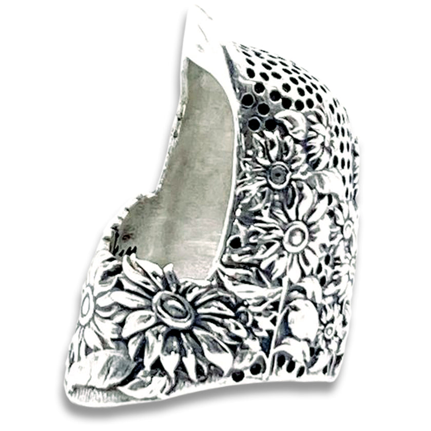 Sunflower Thimble showcasing intricate floral design, ideal for quilters and needleworkers, crafted in sterling silver.