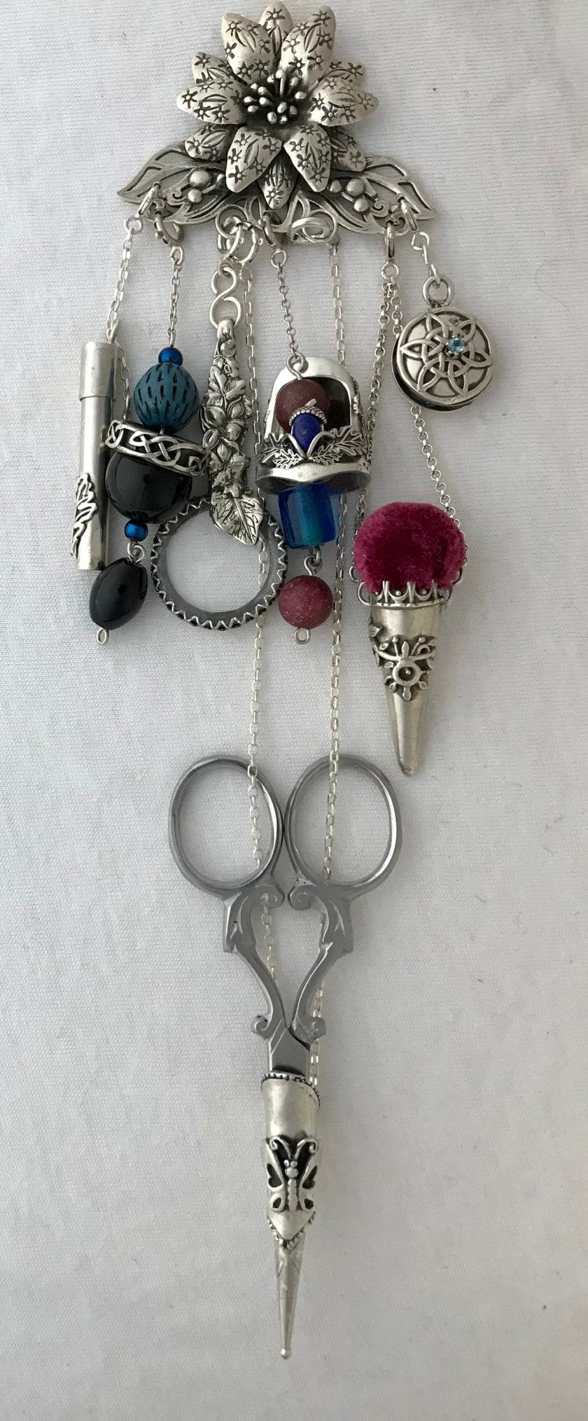 Big Flower Chatelaine with sterling silver thimbles and sewing tools for crafting, showcasing heirloom quality design.