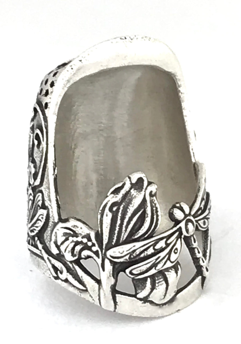 Dragonfly and Iris Thimble in solid sterling silver showcasing intricate designs of dragonflies and iris flowers.