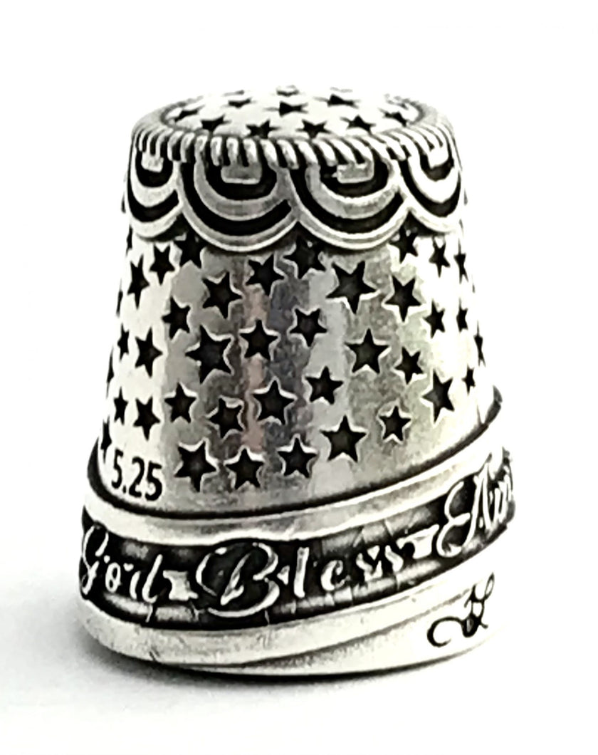 Betsy Ross Thimble handcrafted from 925 sterling silver with stars and 'God Bless America' inscription.